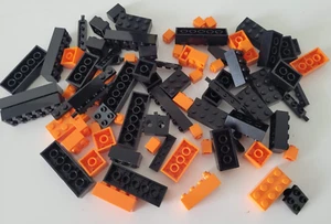LEGO SET OF 82 PIECES – ORANGE AND BLACK RANDOM PIECES BRICKS LEGOS - Picture 1 of 2