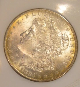 1883 O Morgan Silver Dollar - BU, Rich gold peripheral toning both side 4710 - Picture 1 of 2