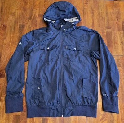 Chaqueta cortavientos impermeable con capucha NIXON cremallera mediana forro de malla negra* Foto 1 de 4
