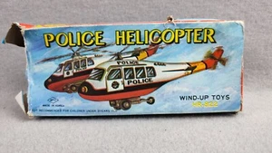 POLICE HELICOPTER HR-822 TIN MADE IN KOREA NEW VINTAGE DEADSTOCK TOY WIND UP - Foto 1 di 7