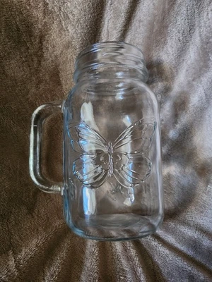 Tarro de albañil de vidrio transparente en relieve con mariposa Dolly Parton 24 oz NUEVO RARO AGOTADO Foto 1 de 2