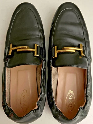 Tod's Mujer Mocasines Planos 39.5 - EE. UU. 9 "Doble T" Zapatos de Cuero Negro Foto 1 de 4