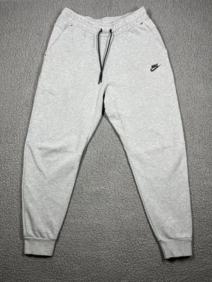 Pantalones deportivos Nike para hombre M Tech polar ajustados cónicos gris jaspeado CU4495-063 Foto 1 de 4