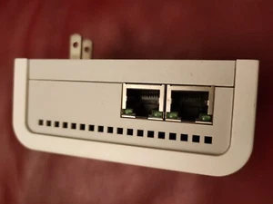 Netgear XE104 85 Mbps Wall-Plugged Ethernet Switch Plug Vintage - Picture 1 of 3