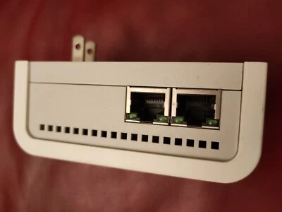 Netgear XE104 85 Mbps Wall-Plugged Ethernet Switch Plug Vintage - Image 1 of 3