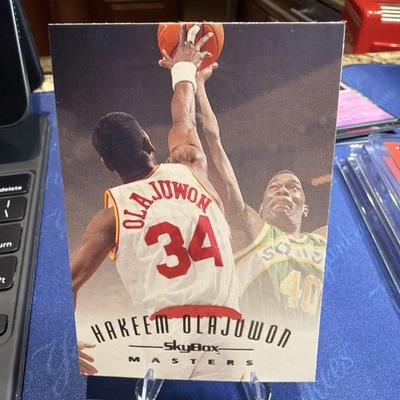 1994-95 Skybox Emotion - Masters Hakeem Olajuwon #116 - Image 1 of 2