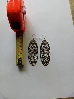 Pendientes colgantes de acero por diseño Foto 1 de 3