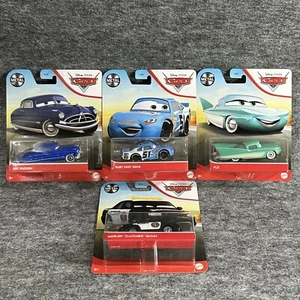 Lotto 4 Frizioni Disney Pixar Cars Rubino Easy Oaks Flo Doc Hudson film pressofuso - Foto 1 di 17
