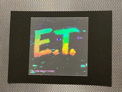 E.T. 1982 de colección PEGATINA HOLOGRAMA CARAMELO PIEZAS REESE PREMIO PREMIUM ESTRELLAS RARAS AÑOS 80 Foto 1 de 3