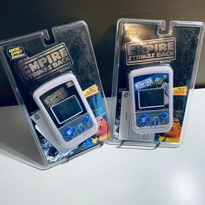 2 Variants Star Wars Electronic Handheld Game- MGA Star Wars the Empire Strikes - Picture 1 of 2