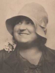 1930s Pretty Woman Cloche Hat Studio Portrait Soft Smile Flower Accent - Picture 1 of 3