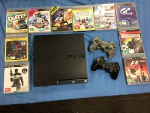 Genuine PlayStation 3 Console with 2 Controllers and 10x Games - Picture 1 of 4