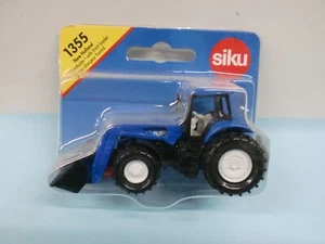 SIKU - TRATTORE PALA MECCANICA NEW HOLLAND - 1355 METAL - Foto 1 di 1