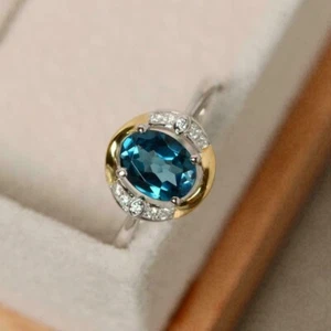 2.2CT Oval Good Cut Lab Created Blue Topaz Halo Ring In 14K Two Tone Gold Plated - Picture 1 of 7