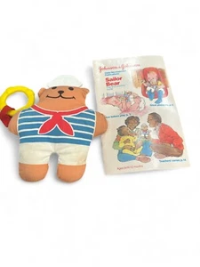 Sonajero de oso marinero bebé Johnson & Johnson de colección D32 con guía de aprendizaje - Imagen 1 de 1