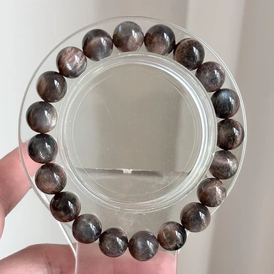 Pulsera de cuentas de piedra solar esquelética negra natural 10 mm Foto 1 de 3