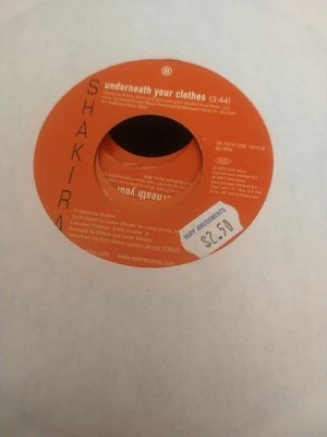 Шакира «Под вашей одеждой / под вашей одеждой» 45 виниловая пластинка - Изображение 1 из 2