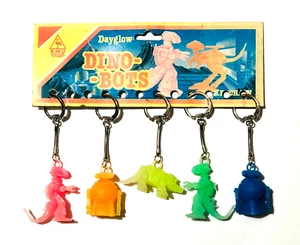 VINTAGE EMU DINO-BOTS ZOIDS ROBOT PLASTIC 5X MINI FIGURES KEYRINGS ON CARD RARE - Picture 1 of 5