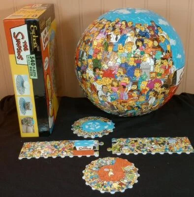 OS SIMPSONS 540 PEÇAS QUEBRA-CABEÇA ESFÉRICO PLÁSTICO 3-D - 9" DIÂMETRO - 2004 Esphera - Imagem 1 de 4