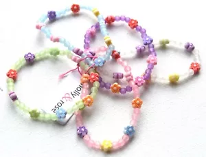 NUEVO Pack Infantil de 5 Flores Color Pastel Dije Pulsera Moda Joyería - Imagen 1 de 1