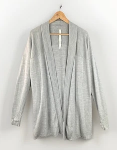 Lululemon Damen Strickjacke Gr. 10 Blissful Zen hellblau 100% Merinowolle Schlitz - Bild 1 von 7