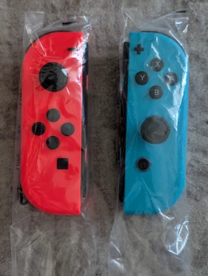 Nintendo Switch JoyCon Set Neon Red and Blue - OPEN BOX - Image 1 of 2