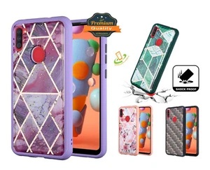 Funda protectora de goma a prueba de golpes con diseño híbrido de mármol para LG Aristo 5 / Fortune 3 - Imagen 1 de 32