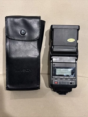 Flash de montaje en zapata Minolta Maxxum 4000 AF con estuche de transporte de cuero Foto 1 de 4