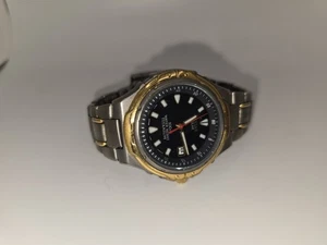Reloj japonés vintage Pulsar solar titanio 100 m dos tonos para hombre V145-0A78 - Imagen 1 de 12
