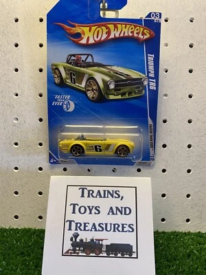 Hot Wheels 2010 más rápido que nunca Triumph Tr6 (amarillo) #3/10 nuevo en paquete #6 dorado 5 velocidades (B443 Foto 1 de 4