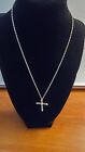 14KT Yellow Gold Cross set with Approximately 20PTS Total Diamonds.  A brilliant