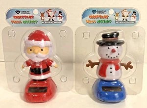 Neu in Verpackung 2 Solar Toys - Santa & Snowman Christmas Sunny Jigglers, Sun Powered Dancers - Bild 1 von 9