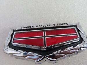 NOS OEM 1974 - 1979 Mercury Marquis  trunk lock keyhole cover emblem flipper