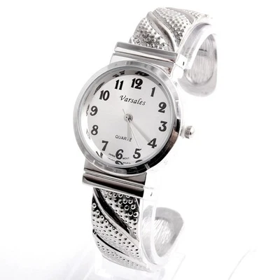 Reloj brazalete plata con 12 números Foto 1 de 2