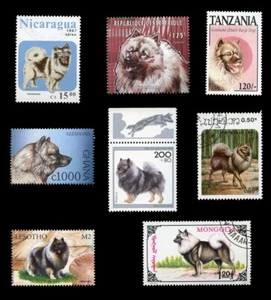 KEESHOND DUTCH DOG INTERNATIONAL POSTAGE STAMPS collection of 8 diferent - Picture 1 of 1