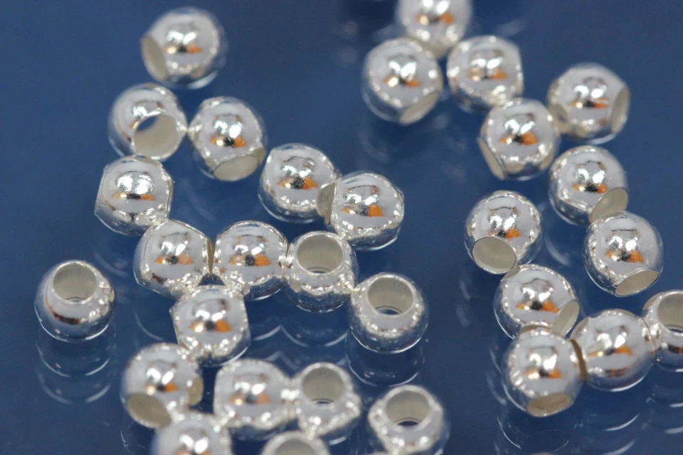 25 x Quetschkugeln 4mm Crimps 925-er Silber Quetschperlen Kugeln 556-25E - Bild 1 von 1