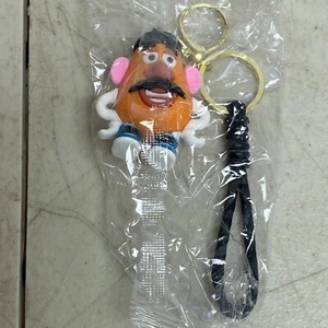 Portachiavi Disney Toy Story in silicone nuovo assortito con Mr. Accessorio testa di patata - Foto 1 di 4