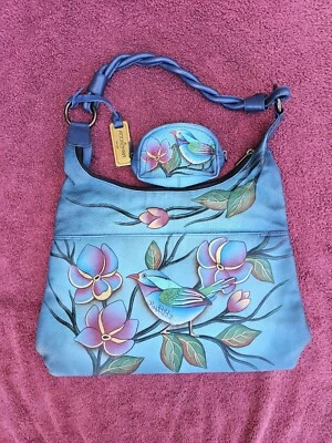 Bolsa de ombro Anuschka de couro pintada à mão pássaro solitário denim com moeda correspondente - Imagem 1 de 4