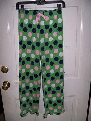 Pantalones de pijama JUSTICE lunares verdes talla 12 para niña usados en excelente estado  Foto 1 de 3