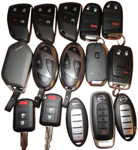 Lot of 15 OEM Assorted Fob For GM, KIA,HYUNDAI, NISSAN,DODGE,MITSU,JEEP,RAM OEM - Picture 1 of 2
