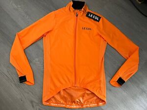 Le Col Mens Saffron / Orange Pro Wind Jacket - Size Small - New With Tags