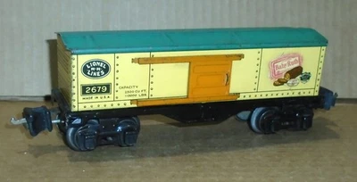 ^ Lionel O Gauge Tin Plate Trains_  "Lionel R.R. Lines Baby Ruth Box Car #2679" - Image 1 of 4