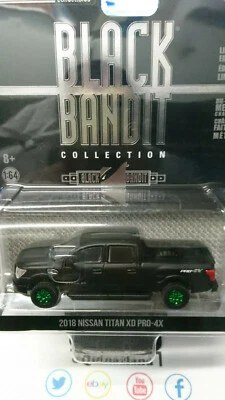 Greenlight Black Bandit 2018 Nissan Titan XD PRO-4X Green Wheels Chase (NG77) - Immagine 1 di 2