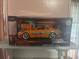 97168) POR JADA. Toyota Supra 1995 Fast and Furious Brian's, escala 1:24 - naranja - Imagen 1 de 1
