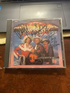 Riders In The Sky AUTOGRAPHED CD The Cowboy Way 3 Signatures - Foto 1 di 3