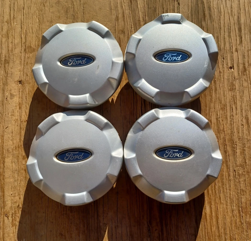 Ford Escape center cap set of 4, 2001-2006 part number YL84 1A096 EB S2 - Image 1 of 3
