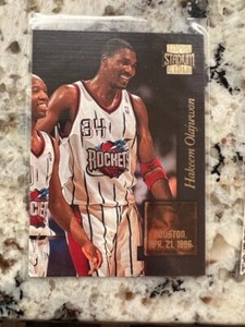 1996-97 TOPPS STADIUM CLUB GOLDEN MOMENTS CARD ROCKETS AKEEM OLAJUWON #GM5