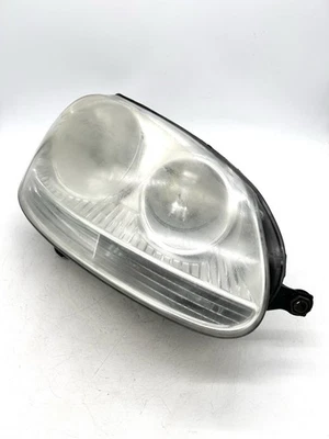 Faro derecho del pasajero Volkswagen Jetta/GTI/Rabbit 2006-2009 genuino OEM Foto 1 de 4