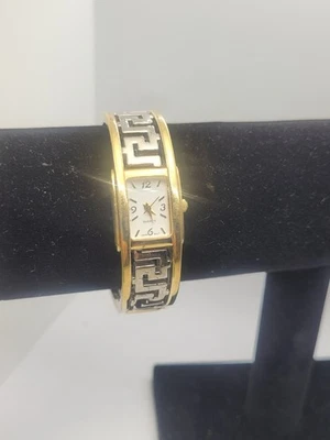 Reloj pulsera brazalete geométrico bicolor vintage Avon movimiento cuarzo 6,5" Foto 1 de 4