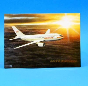 Cartolina Interflug | aereo Airbus A 310 | 1989 circa | immagine e casa Reichenbach F - Foto 1 di 1